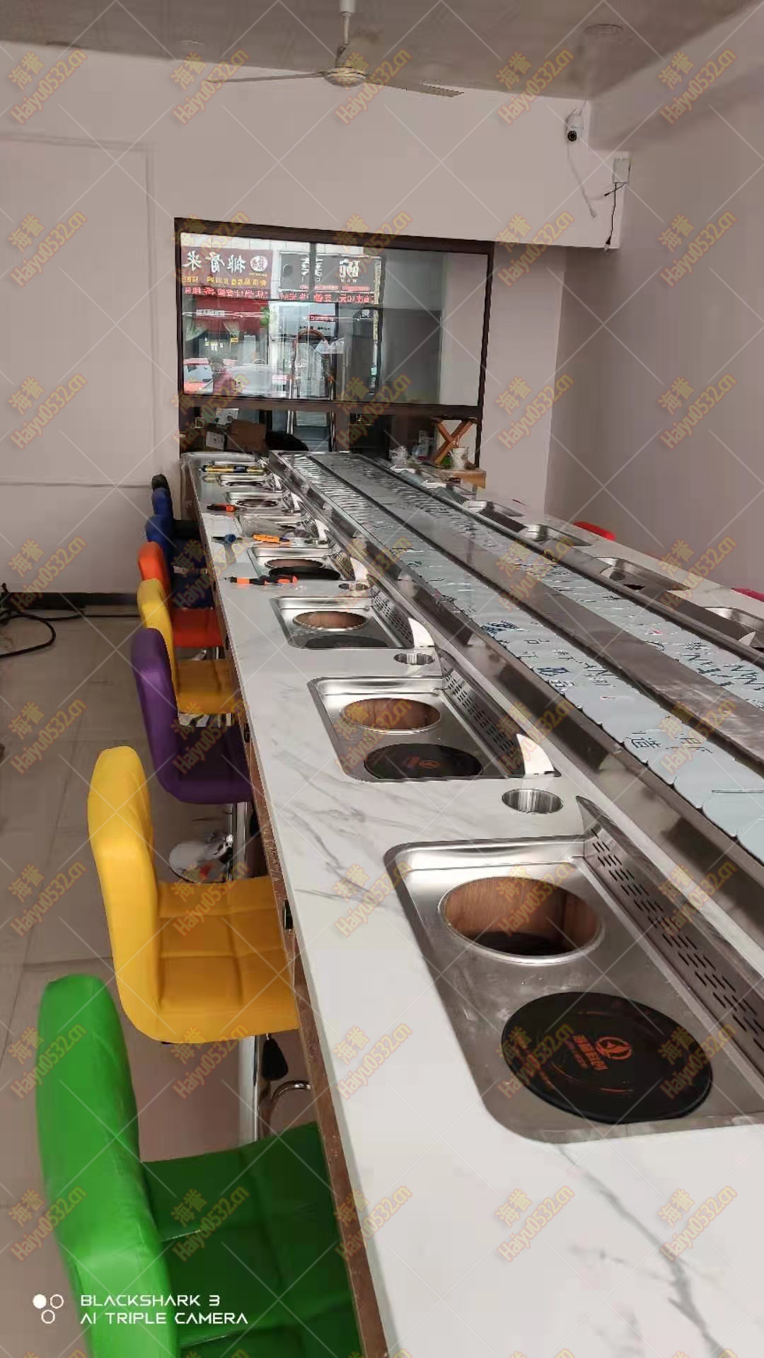 美食城直线无烟涮烤旋转小火锅设备完工